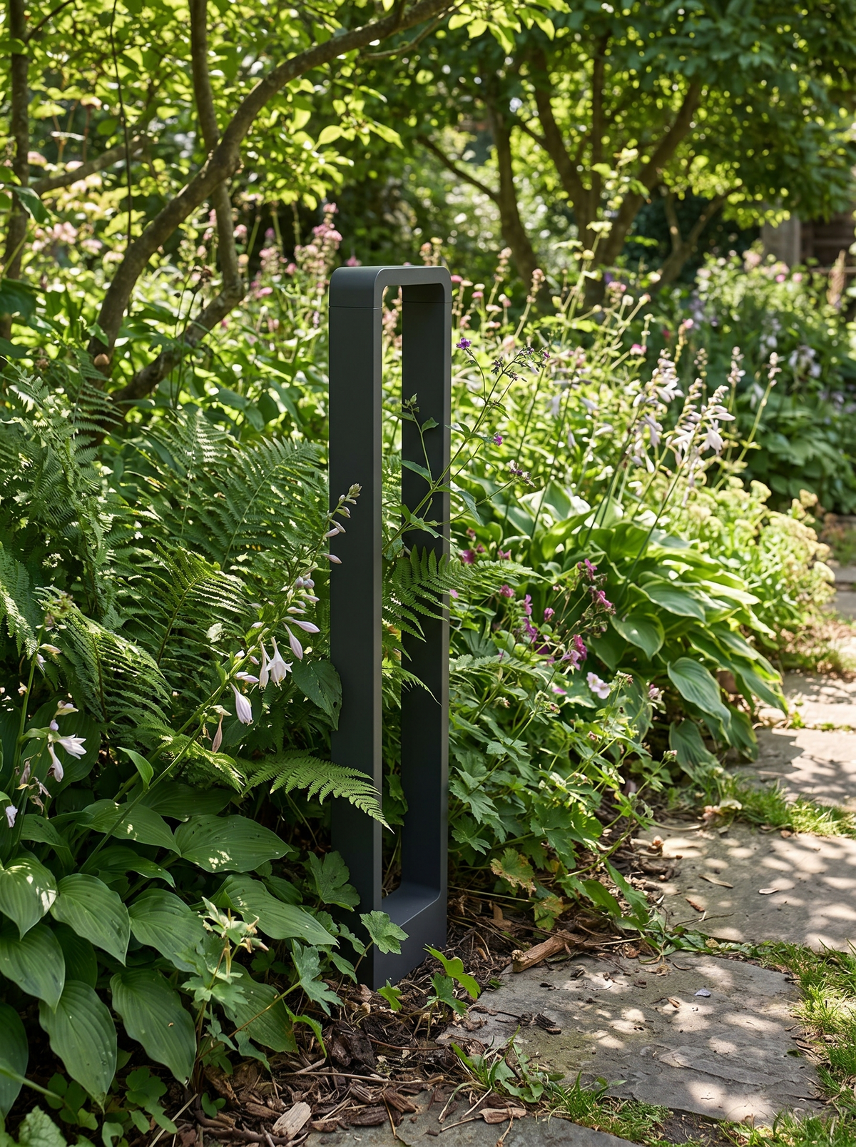GOODNEST MERIDIAN bollard receding into daytime planting
