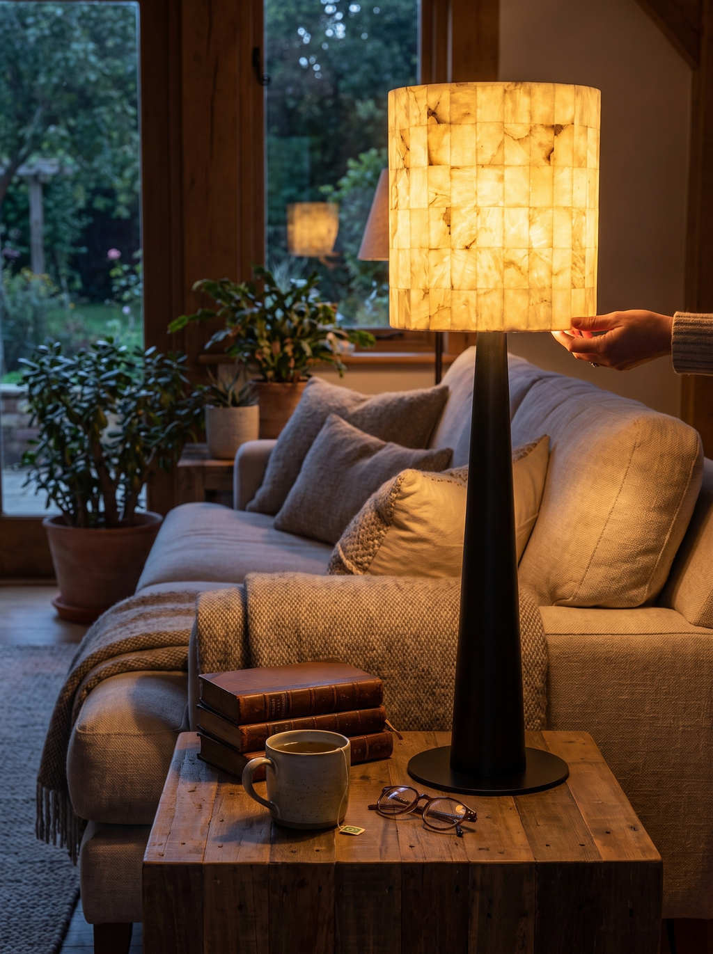 GOODNEST STRATA cylindrical shade glowing as a column of light