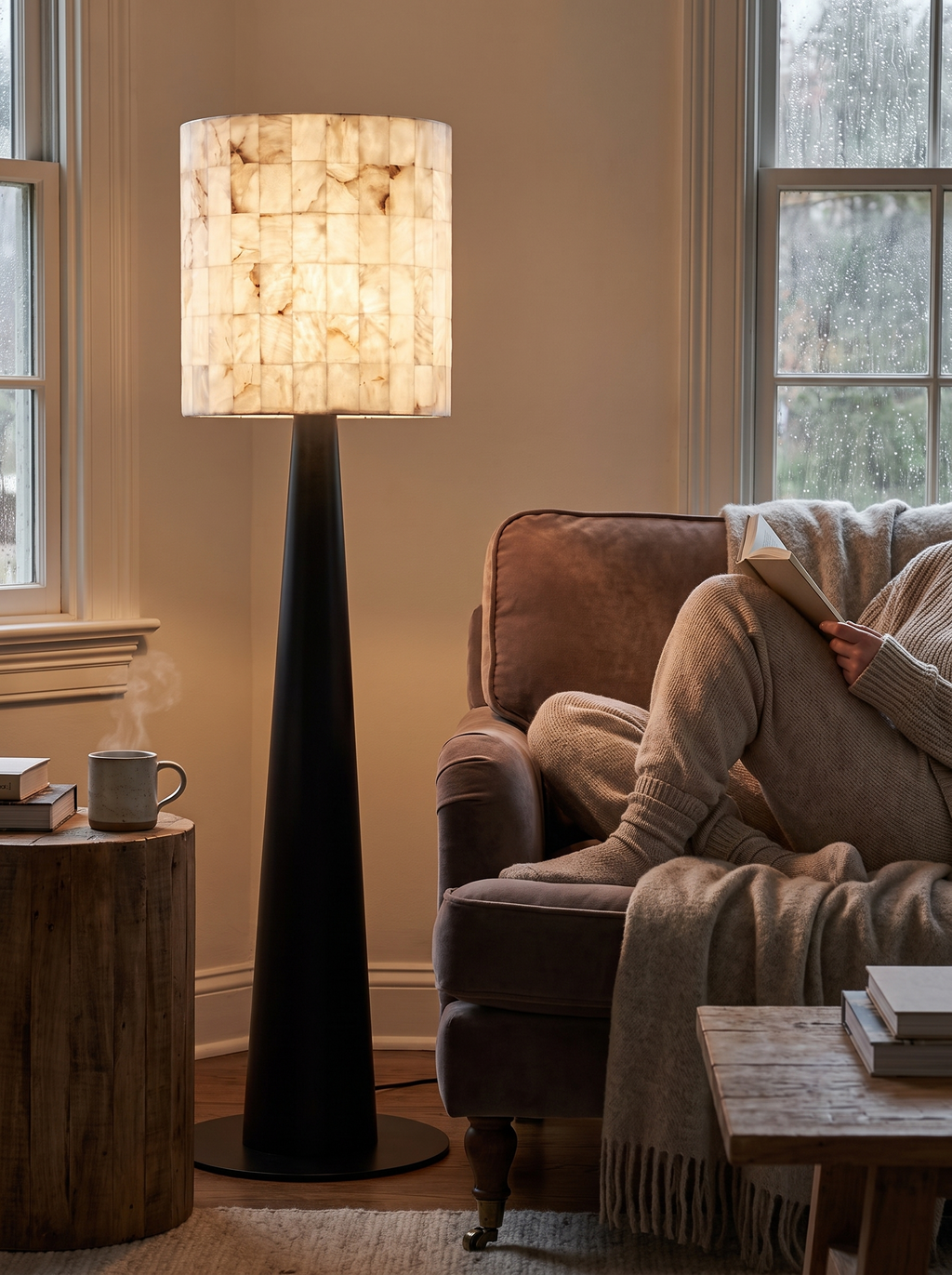STRATA floor lamp beside a reading chair