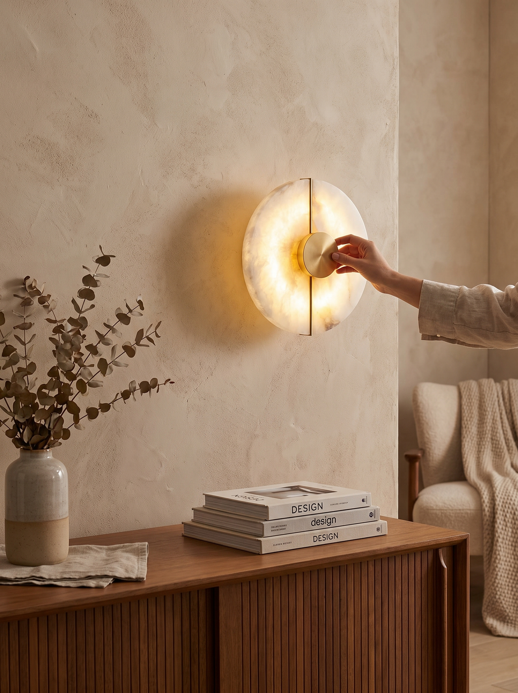 GOODNEST SOLSTICE wall light glowing softly in a hallway