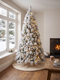 Flocked Christmas tree with snow across every branch