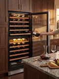 Large dual zone wine fridge full of bottles