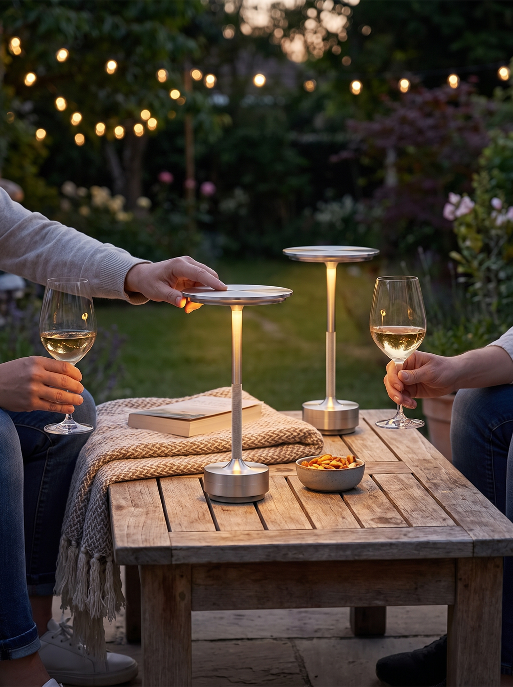 EMBER pair of cordless lamps moved outdoors