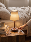 WICK rechargeable bedside lamp on a nightstand