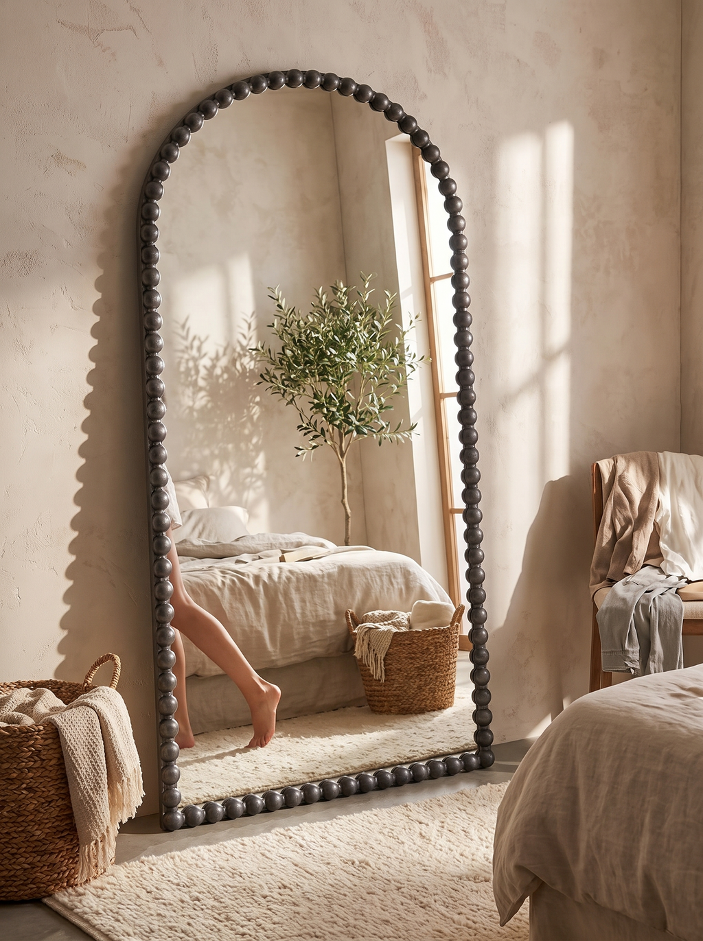 GOODNEST FILIGREE leaning on the floor beside a wall